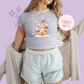 PRINTED GINGERBREAD CASTLE - EXCLUSIVE TO MoM - WOMENS CROPPED RIBBED BABY TEE