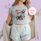 PRINTED SUPER CHRISTMAS - WOMENS CROPPED RIBBED BABY TEE