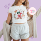 PRINTED CHRISTMAS SORCERER - WOMENS CROPPED RIBBED BABY TEE