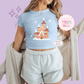 PRINTED GINGERBREAD CASTLE- EXCLUSIVE TO MoM - WOMENS CROPPED RIBBED BABY TEE