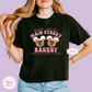 PRINTED MAIN STREET BAKERY PINK - WOMENS BOXY T-SHIRT